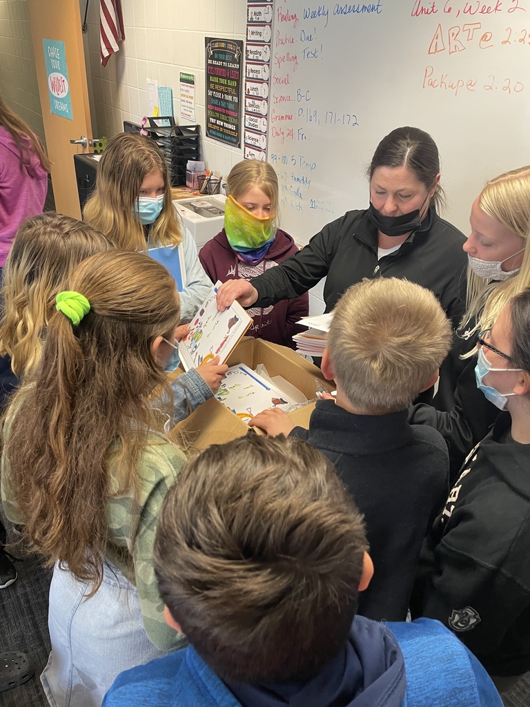 Ms. Hoverson's 5th grade class published a book with Student Treasures. Here are pictures of the arrival, book signing, and group pictures.#gofreeze 